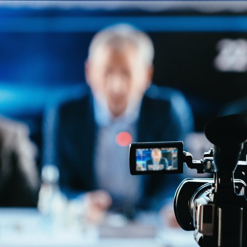camera-recording-press-conference.jpg